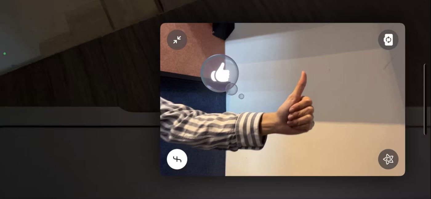 Comment utiliser les gestes de la main pour déclencher une réaction lors d'un appel vidéo FaceTime